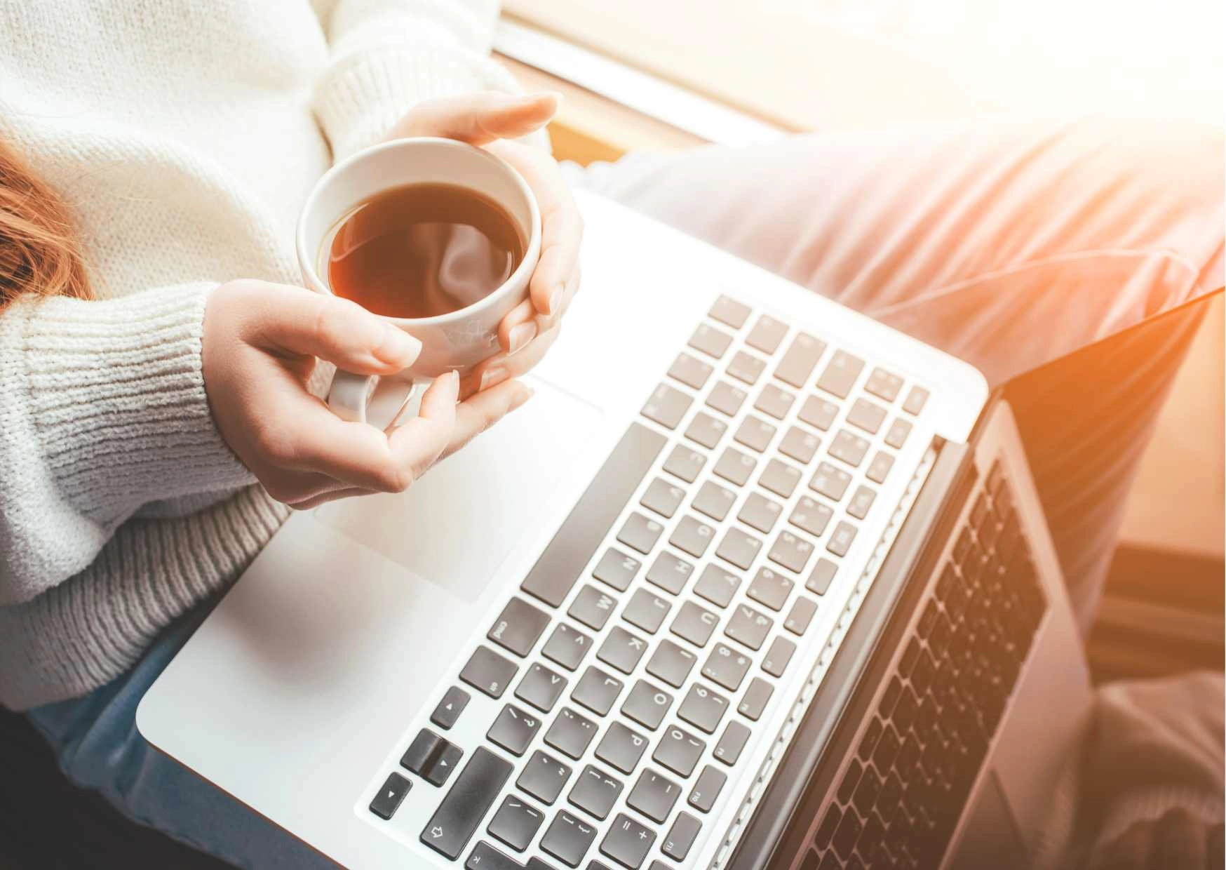 Computer and cup of coffee